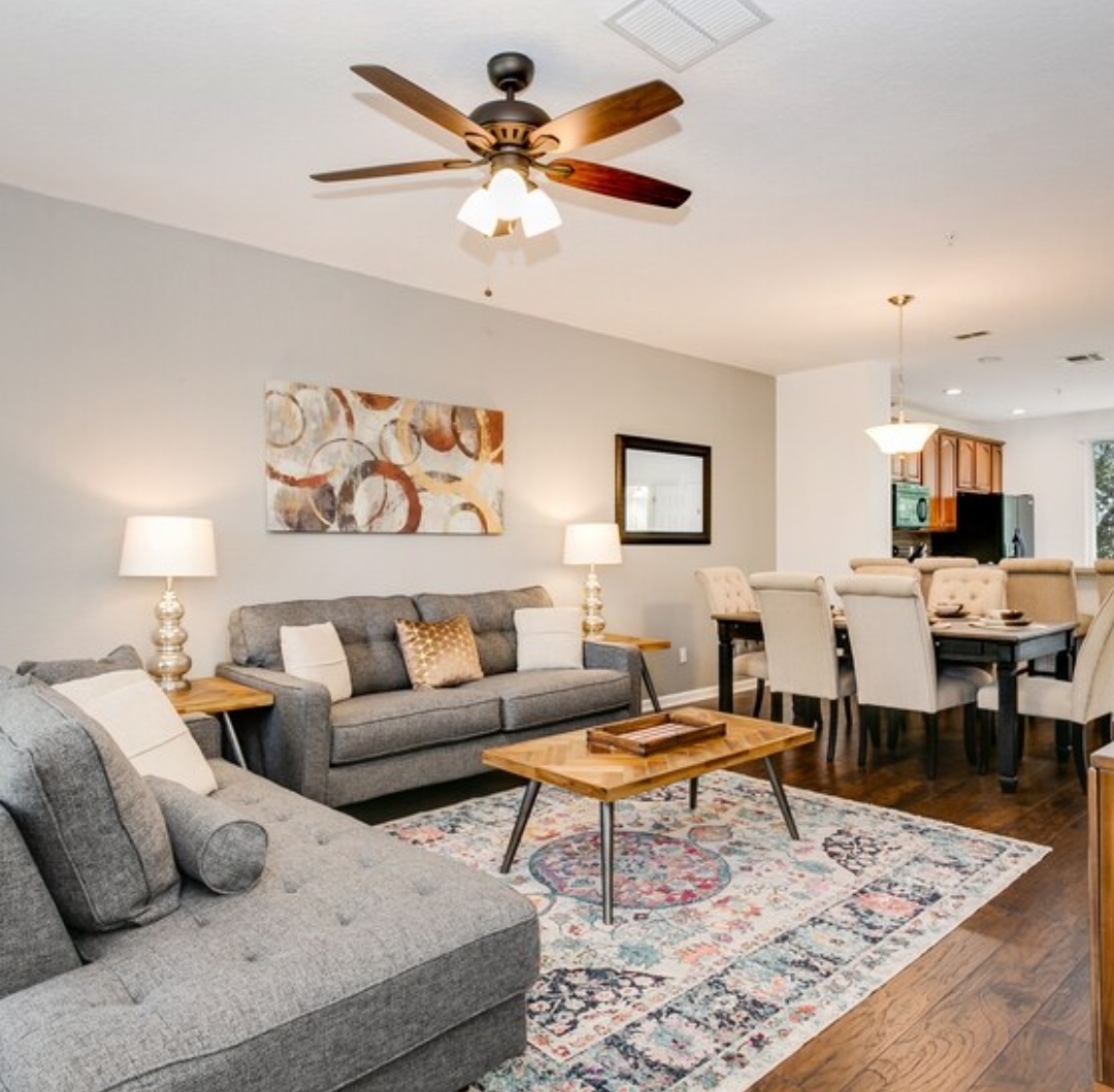 Clean living room with dining area ready for guests