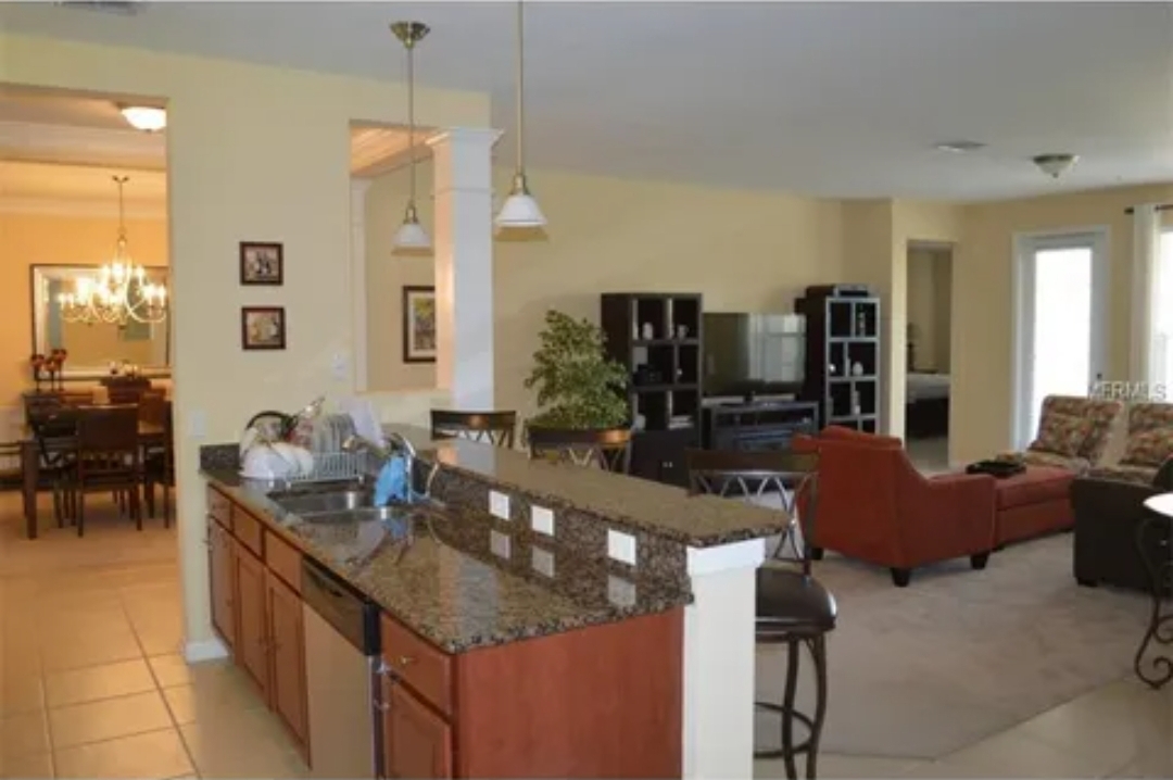 Open kitchen and living room in a managed vacation home